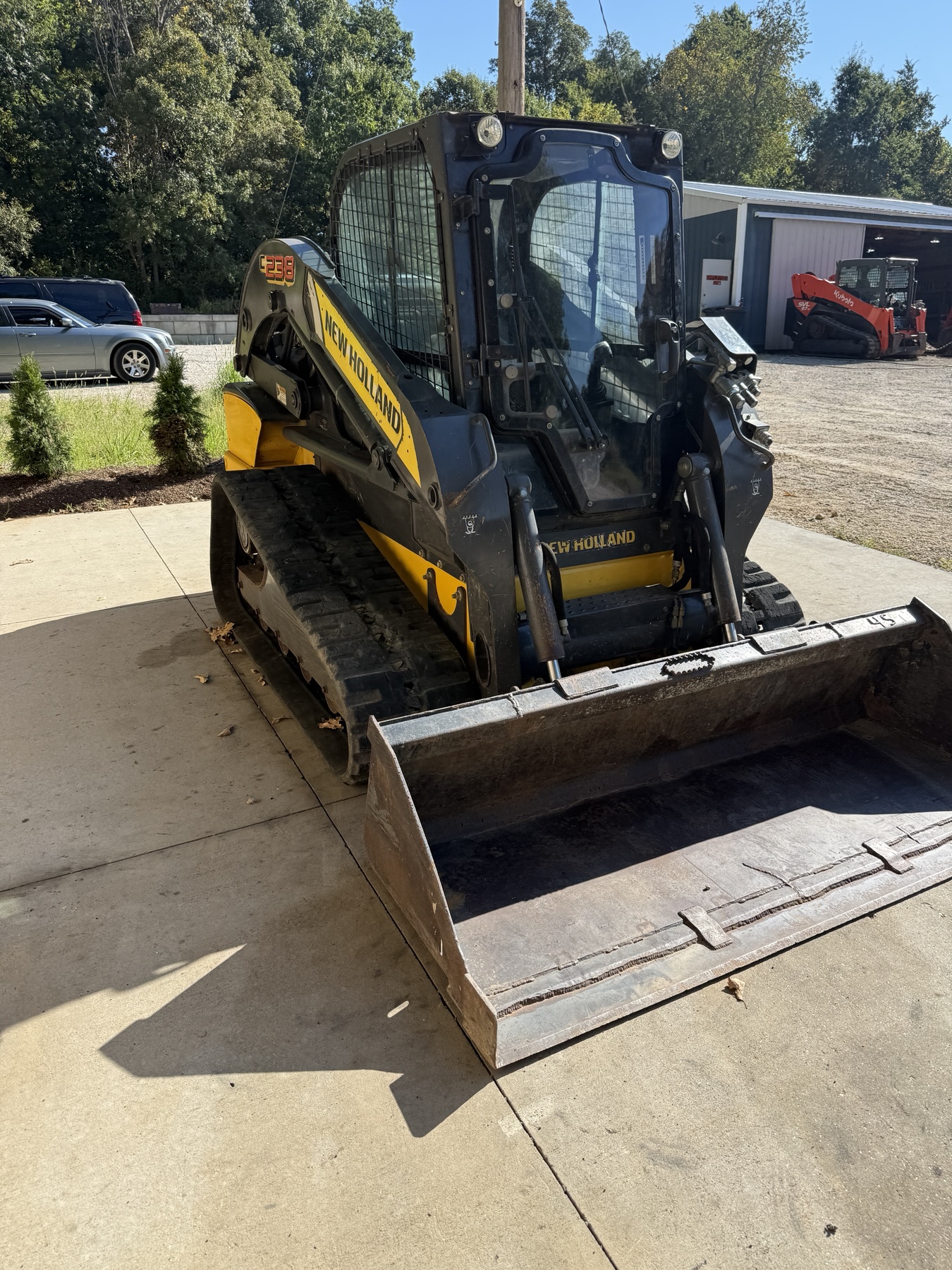 New Holland C238 front right three-quarter view