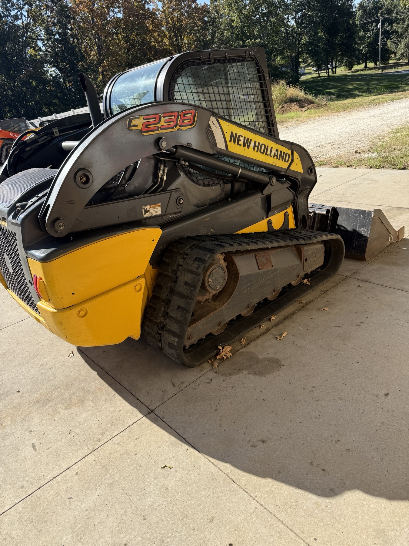 New Holland C238 left rear three-quarter view