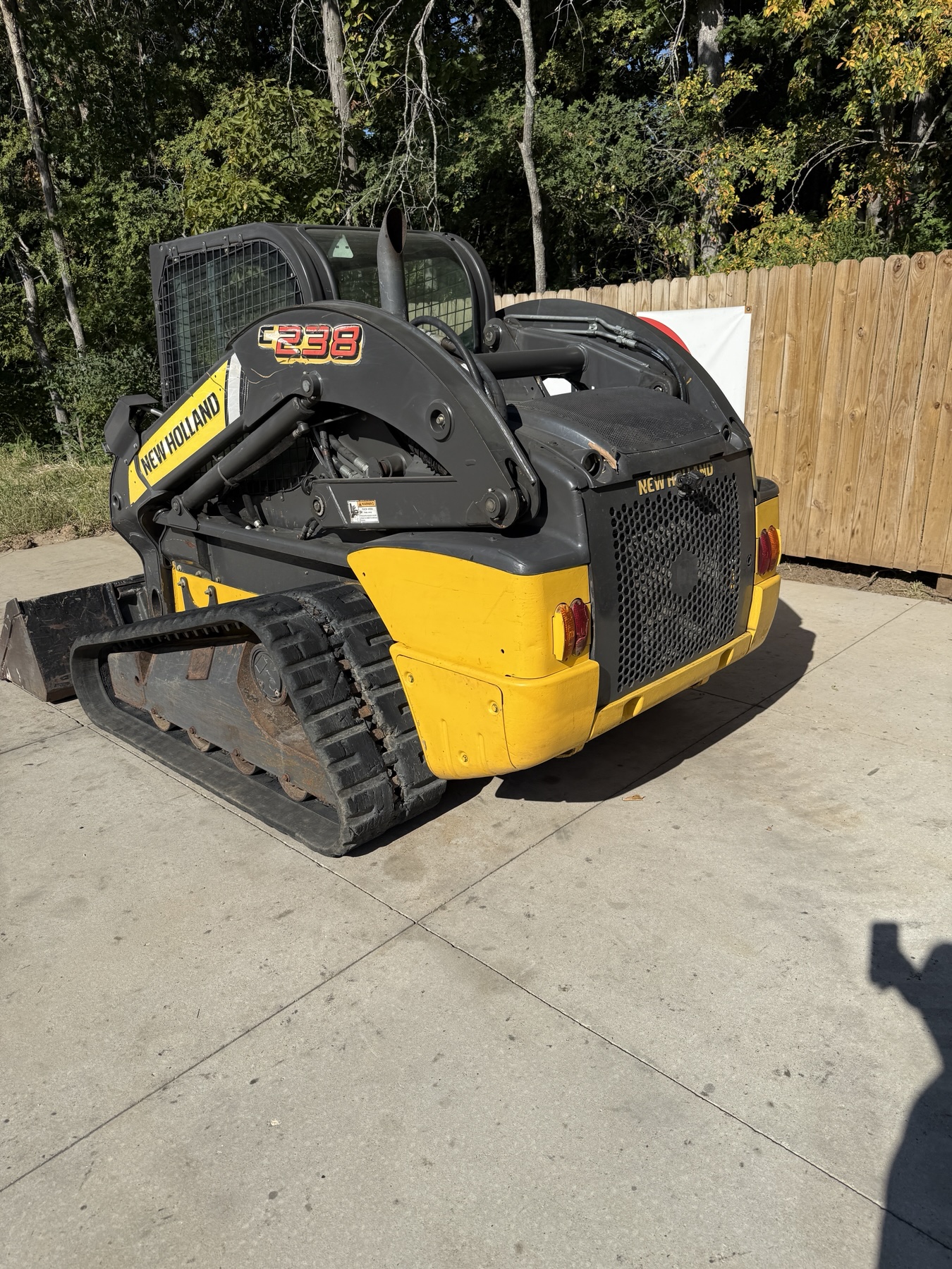 New Holland C238 right rear three-quarter view