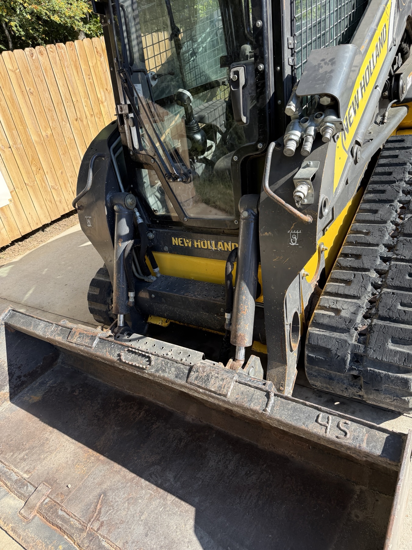 New Holland C238 hydraulic couplers, cab entry and bucket
