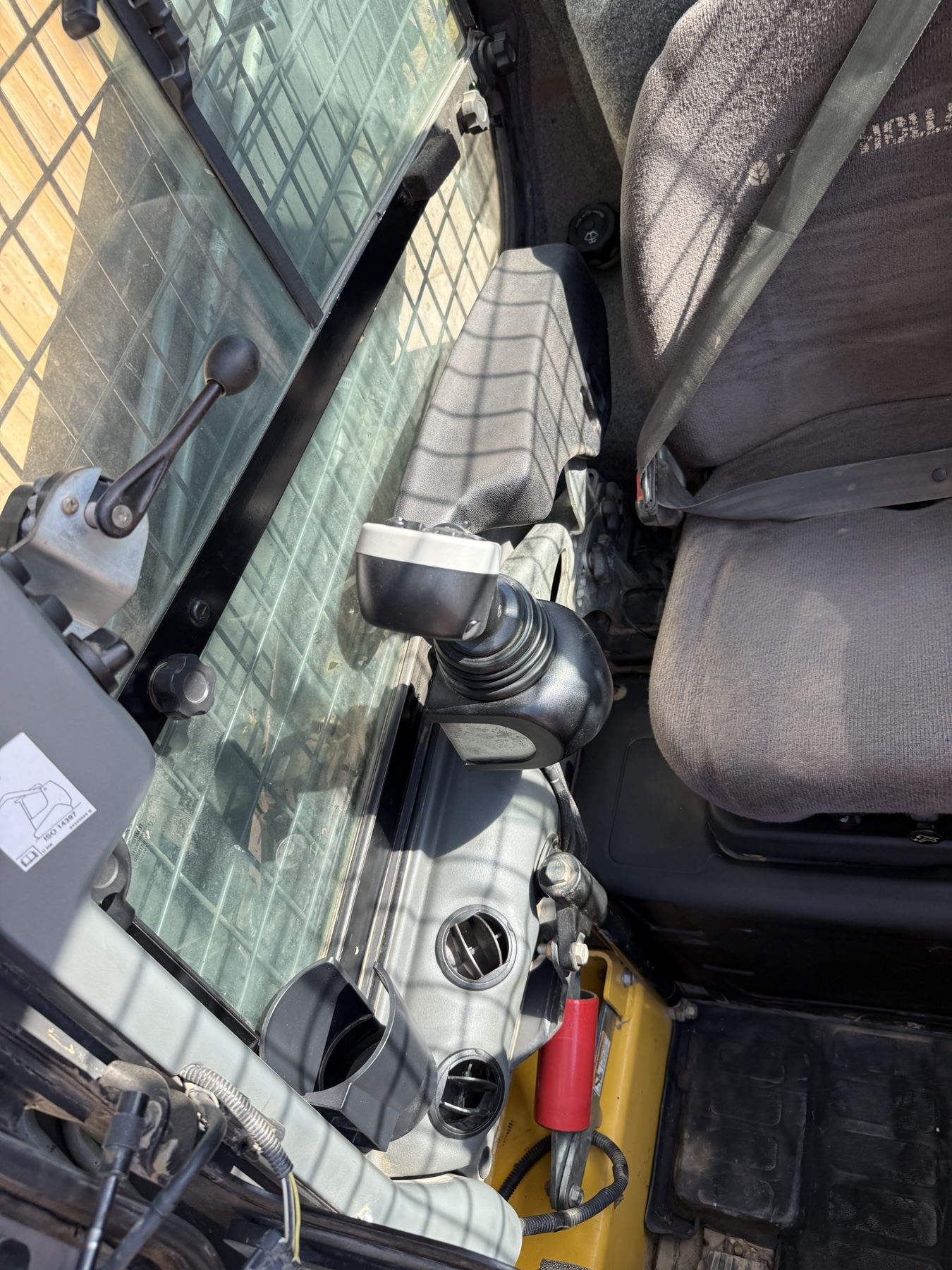 New Holland C238 left-hand joystick and cab vents