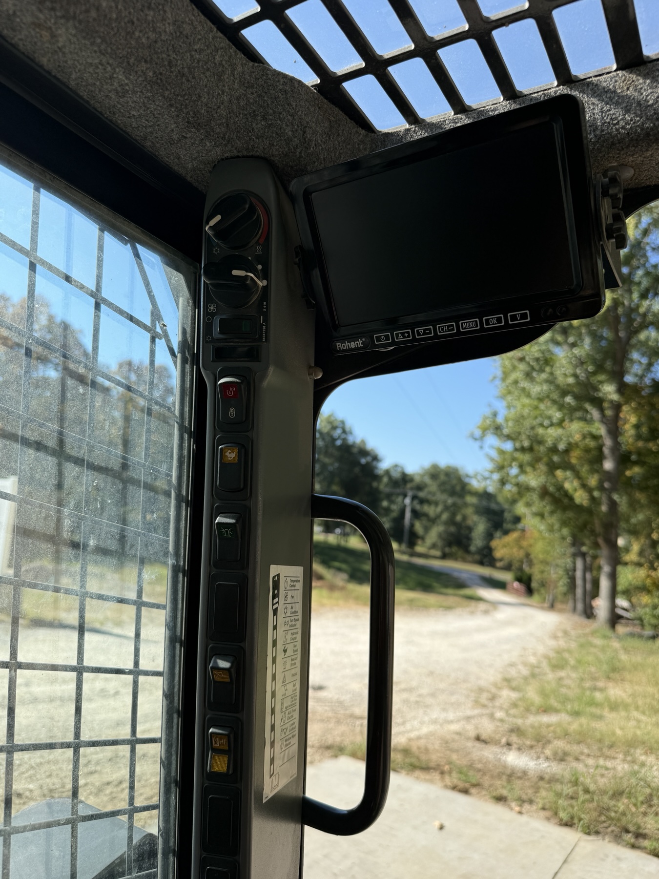 New Holland C238 backup camera display and climate controls