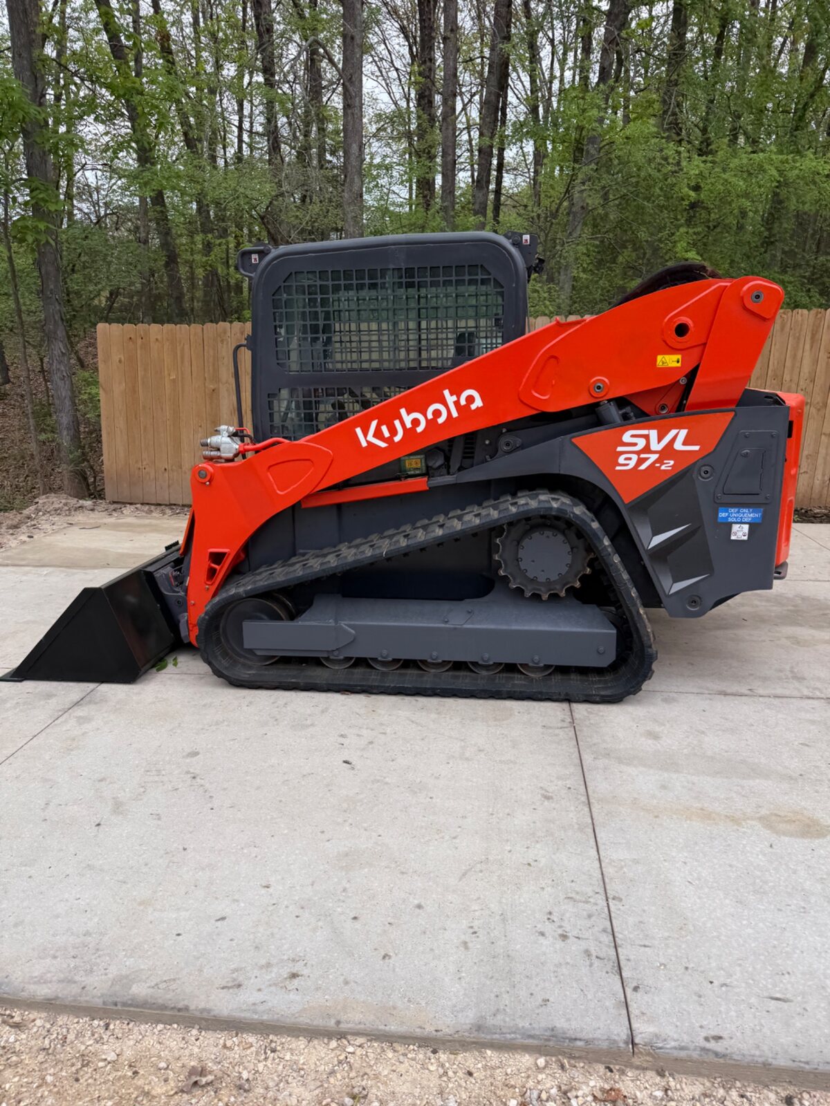 Kubota SVL97-2 left profile showing new tracks and undercarriage