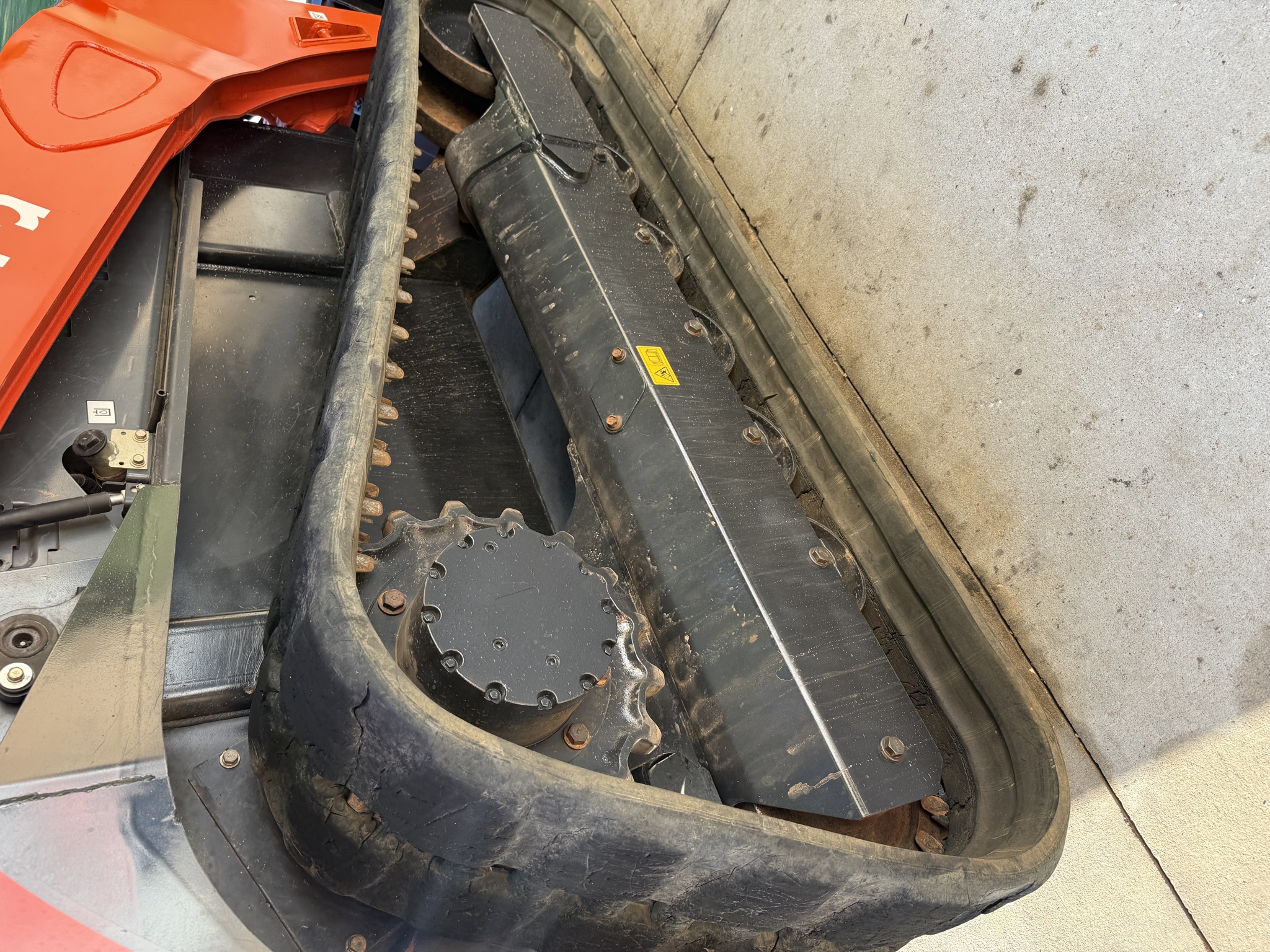 Kubota SVL97-2 drive sprocket and undercarriage detail