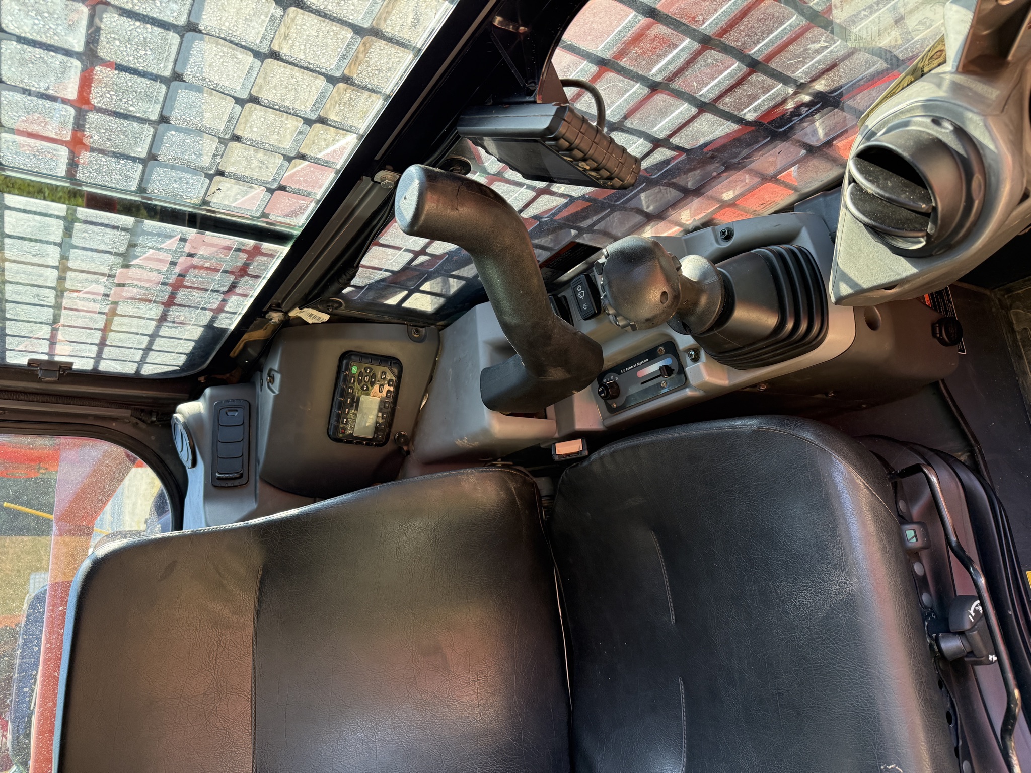 Kubota SVL97-2 right-hand controls and radio