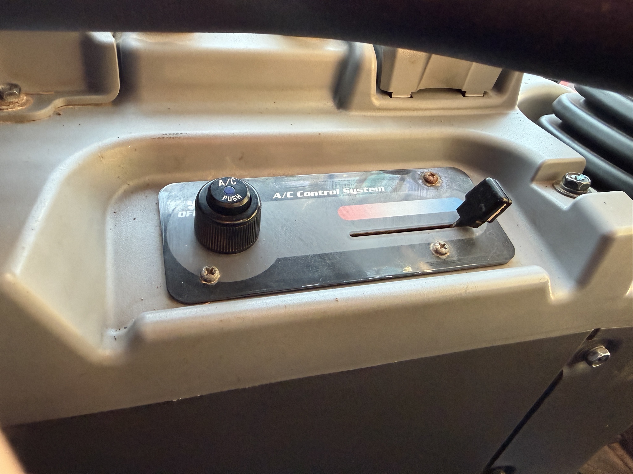 Kubota SVL97-2 heat and air-conditioning controls